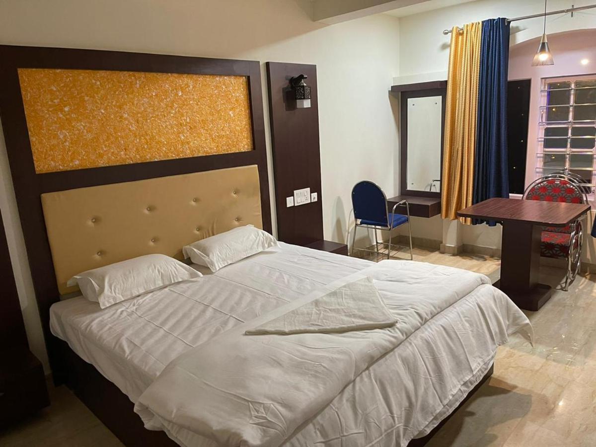 Bassac Residency Hotel Changanācheri Buitenkant foto