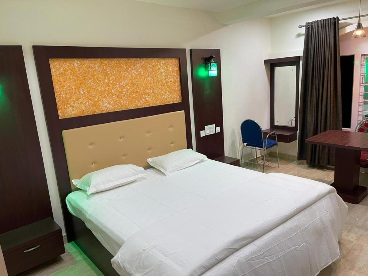 Bassac Residency Hotel Changanācheri Buitenkant foto